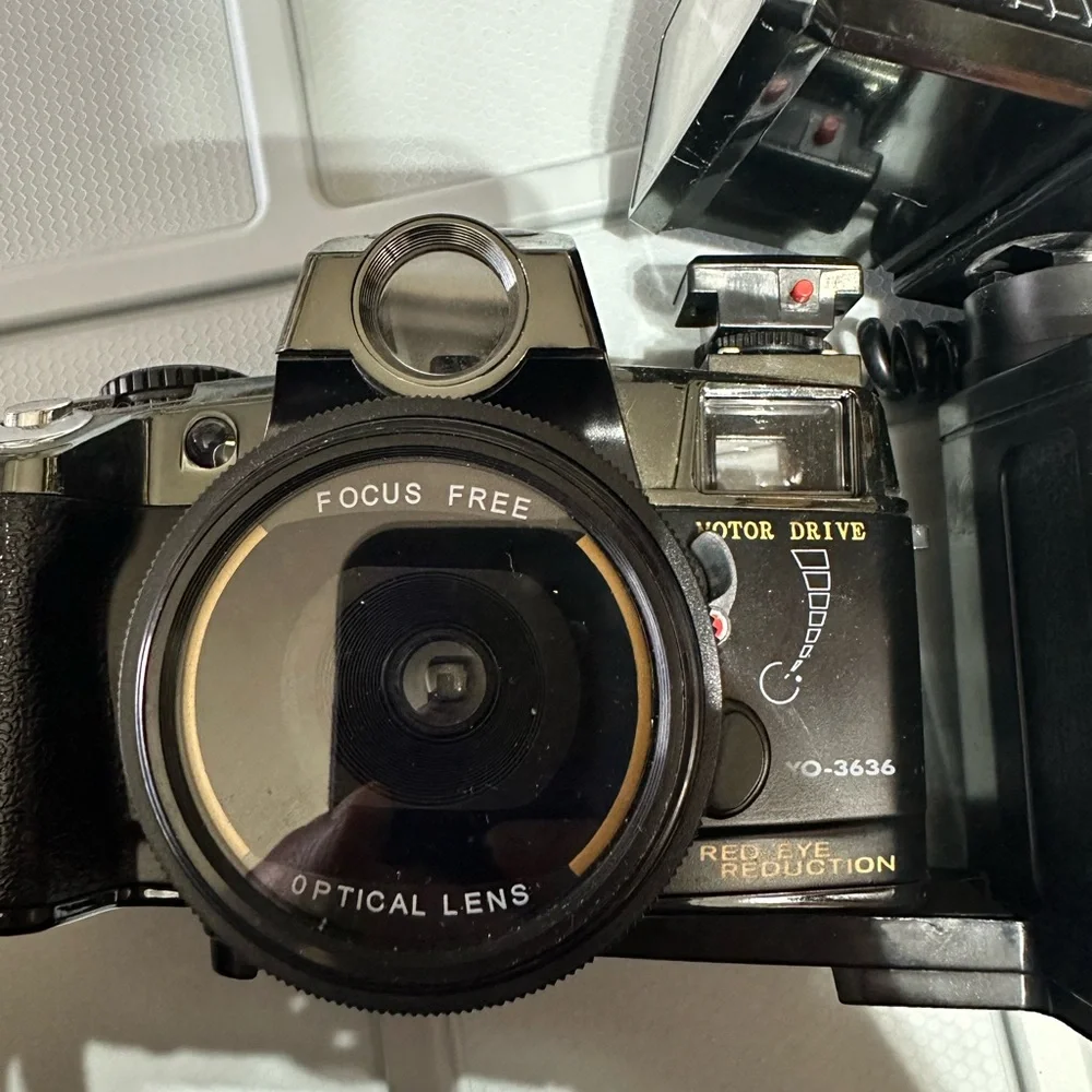 Vintage Canon Motor Drive Red Eye Reduction Black Camera with flash